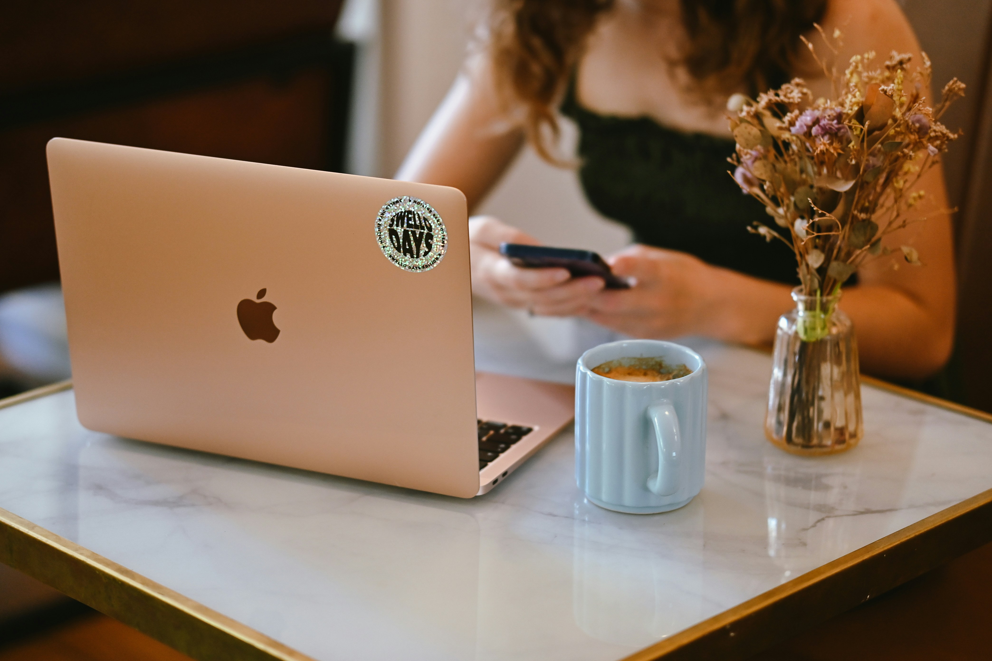 Laptop on a desk showing marketing work in progress